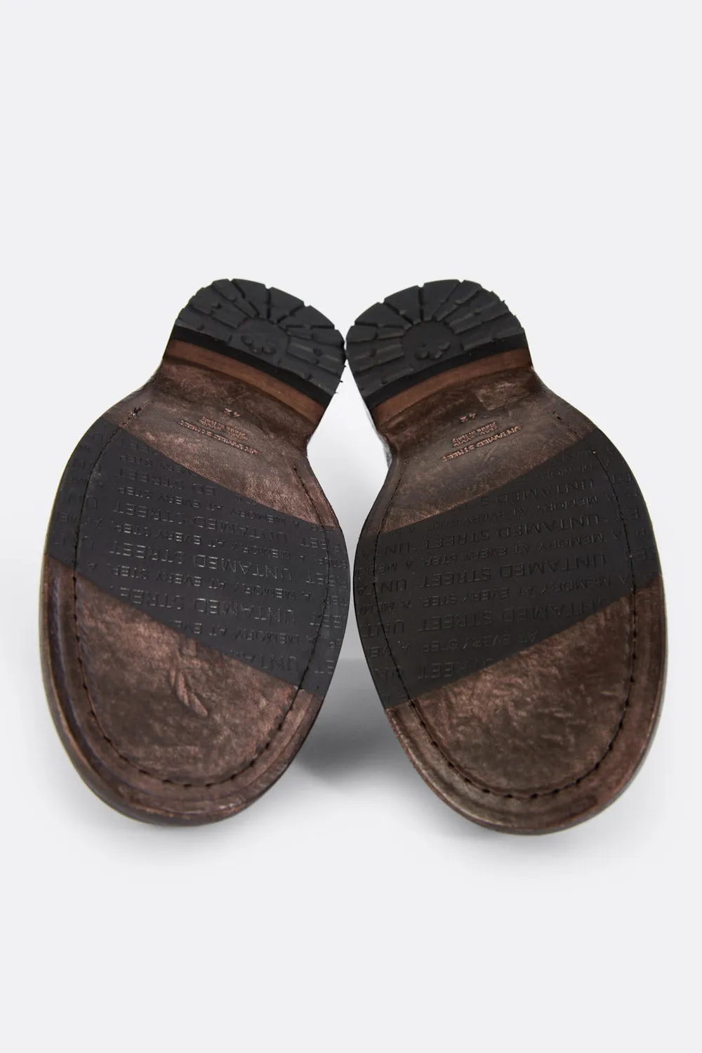 CURZON raw-timber military boots.