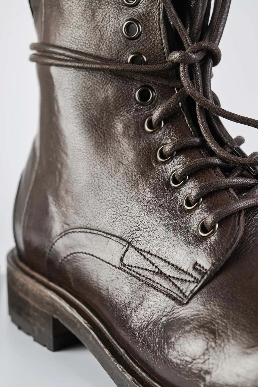 CURZON raw-timber military boots.