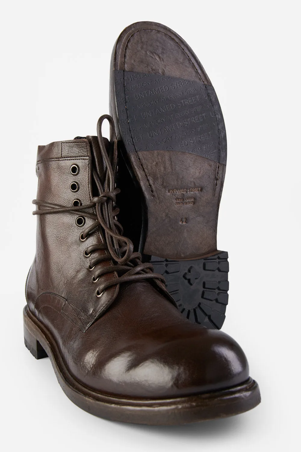 CURZON raw-timber military boots.