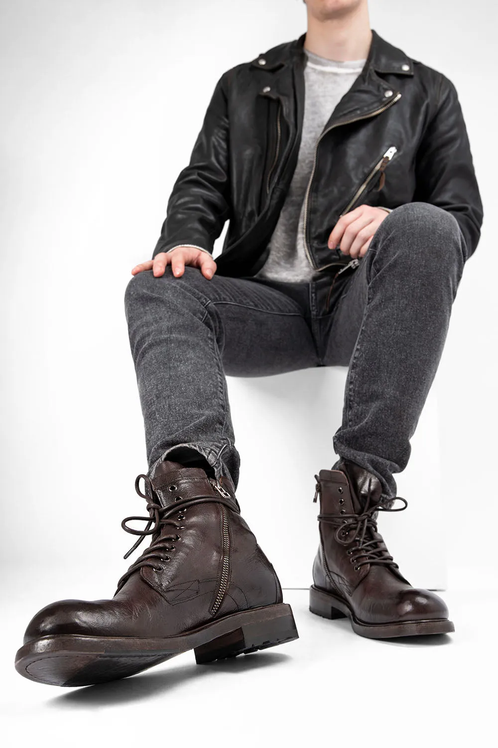 CURZON raw-timber military boots.