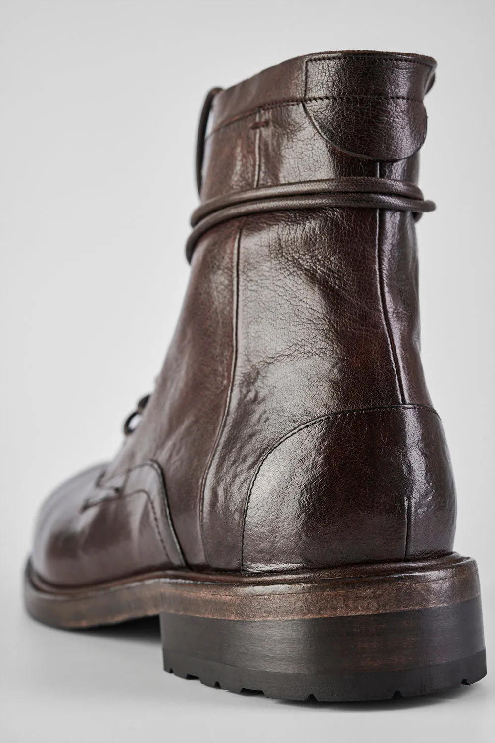 CURZON raw-timber military boots.