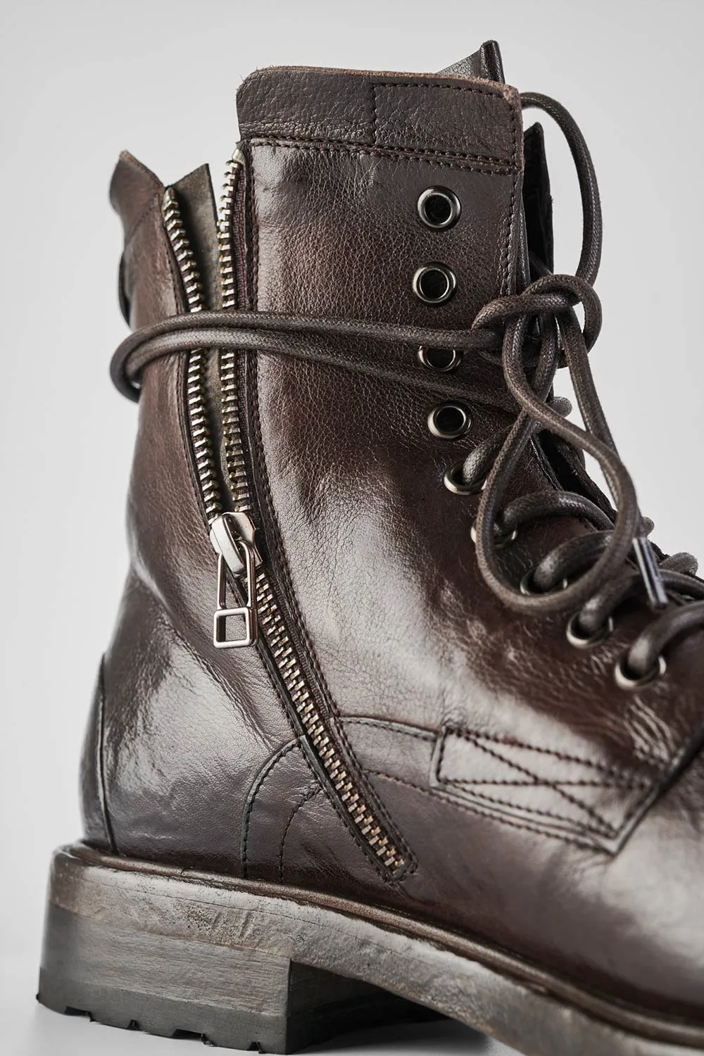 CURZON raw-timber military boots.