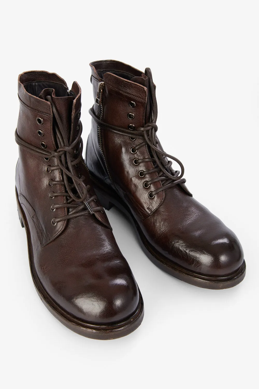 CURZON raw-timber military boots.